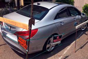 Seattle man builds fence around car-share vehicle at duplex