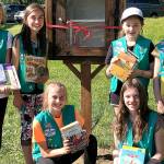 Girl Scouts bring free books to Snohomish park