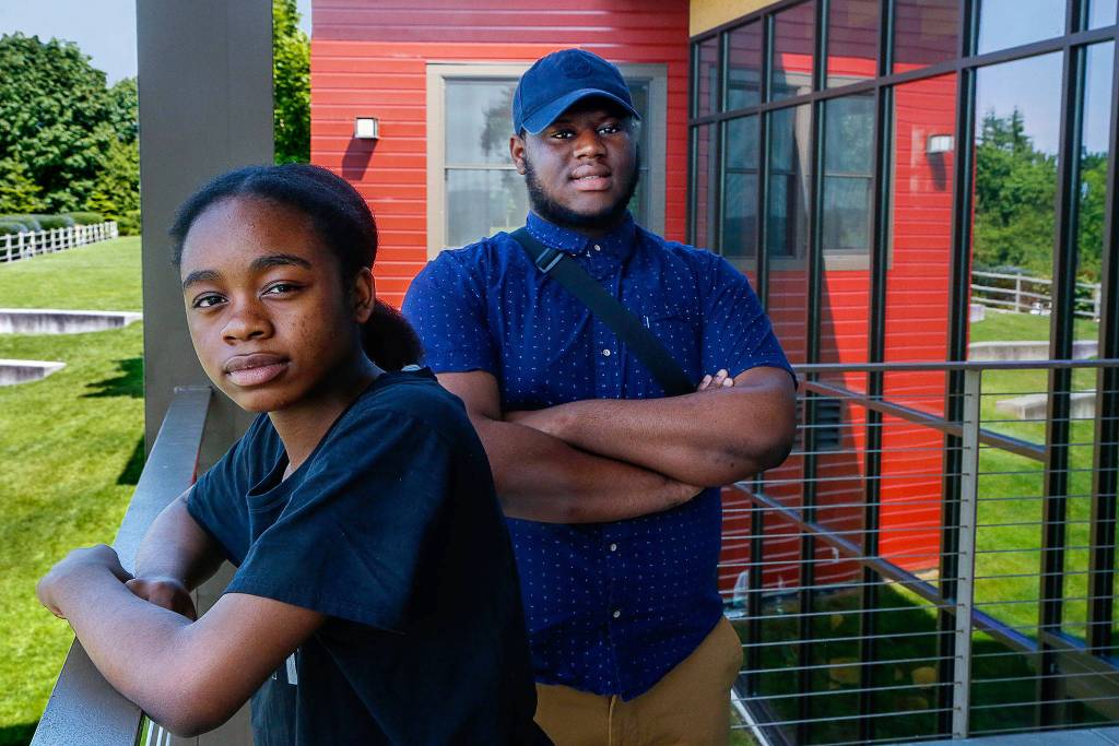 Glenda Wabaluku, 14 (left), and Abdulkarim Sankareh, 18, pay a visit to Rosehill Community Center in Mukilteo with Rachel Kittle, executive director of Leadership Launch. Wabaluku and Sankareh will join 16 other local teens involved in a grassroots mentoring program to put on a program called <a href="https://www.heraldnet.com/news/we-are-culture-brings-food-fun-and-frank-talk-to-mukilteo/" target="_blank">We Are Culture.</a> (Dan Bates / The Herald)