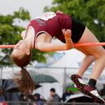 Cascades Katie Nelson clears the high bar at the Washington State track finals at Mount Tahoma Stadium on May 25 in Tacoma. (Andy Bronson / The Herald)