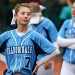 Meadowdales Emma Meyer walks off the field dejected with her team after losing to Bonney Lake during the 3A Softball State Championship at the Regional Athletic Complex in Lacey on May 24. (Kevin Clark / The Herald)