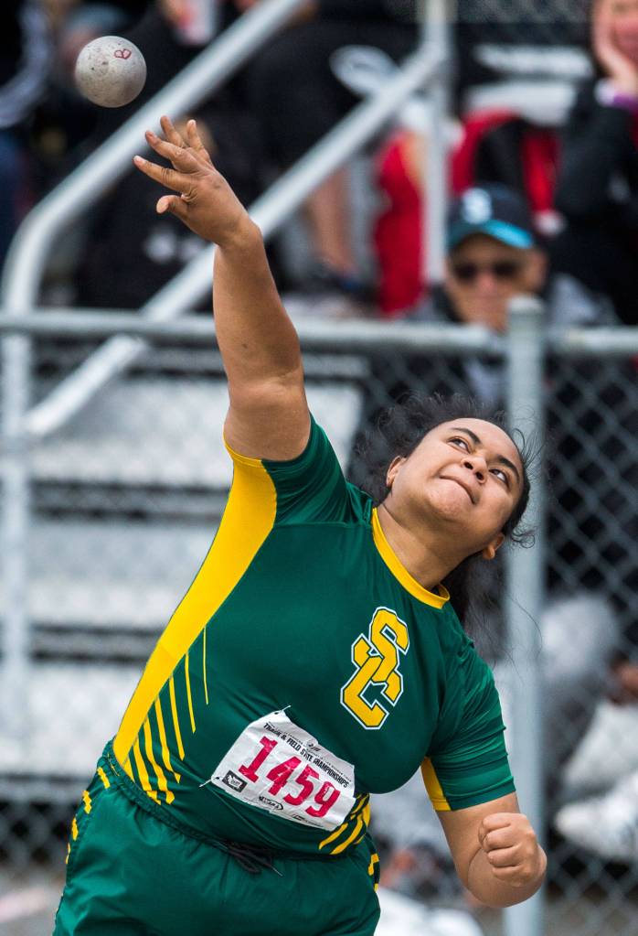 Shorecrests Kiana Lino launches the shot for a 43 feet, 4.75 inches throw during the second day of competition at the 4A/3A/2A State Track and Field Championships at Mount Tahoma High School on May 23 in Tacoma. (Olivia Vanni / The Herald)