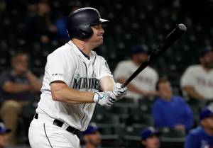Jay Bruce of the Seattle Mariners reacts after flying out against the Texas Rangers during the eighth inning of a game on May 28 in Seattle. (AP Photo/Ted S. Warren)