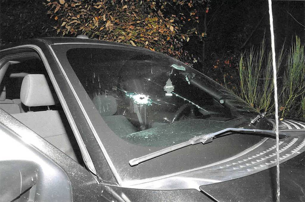 Sheriffs Deputy Art Wallin shot Peters twice, but only a single bullet hole can be seen in a picture of the scene. Attorney Jeff Campiche argues that Wallin fired the fatal shot after the passenger door was open. (Campiche Arnold)