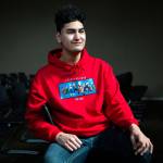 Graduate Tai Chase at Sno-Isle Technical Skills Center on June 5 in Everett. (Olivia Vanni / The Herald)