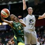 The Storms Jewell Loyd shoots as the Lynxs Jessica Shepard defends during a game on June 4 at the Angel of the Winds Arena in Everett. (Andy Bronson / The Herald)