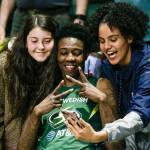 The Storms Natasha Howard poses for photos with fans after Seattle beat the Minnesota Lynx 84-77 on June 4 at the Angel of the Winds Arena in Everett. (Andy Bronson / The Herald)