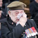 A veteran wipes his eyes during a ceremony to mark the 75th anniversary of D-Day, Wednesday in Portsmouth, England. (AP Photo/Alex Brandon)