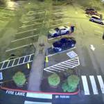 Security footage shows the victim apparently pointing something at the shooter, Mill Creek police said. (Mill Creek Police)