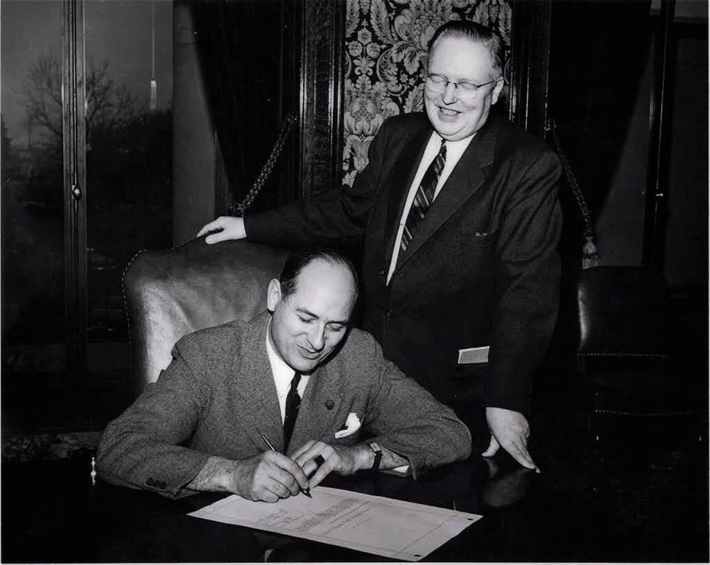 The late Howard S. Bargreen (standing), who served in the state House and state Senate, with Gov. Albert Rosellini. Both championed the 1962 Seattle Worlds Fair. (Contributed Photo)