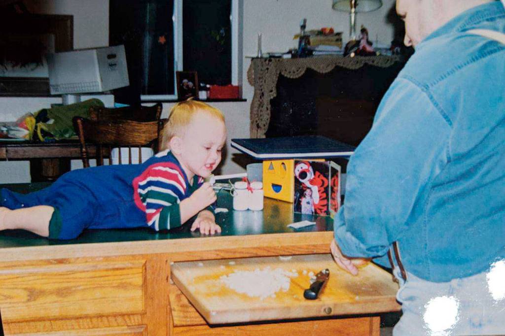 Andrew Roo Strom bonded with his dad, Kirby Strom, while cooking together. (Family photo)