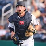 The AquaSoxs Carter Bins makes his way to the dugout during an exhibition game against the Merchants on June 12, 2019, at Funko Field at Everett Memorial Stadium. (Kevin Clark / The Herald)