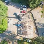 Members of the Timber Framers Guild and volunteers raised a picnic shelter at Lake Roesiger county park in late May. (Rich Patton)