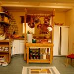 In the kitchen, the doors of the refrigerator open to reveal fully-stocked shelves. (Maria Matson / Whidbey News-Times)
