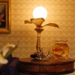 A living room table, complete with a lamp and a goldfish bowl. (Maria Matson / Whidbey News-Times)