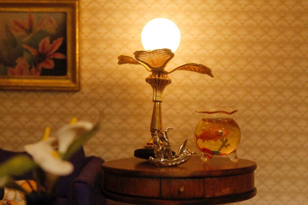 A living room table, complete with a lamp and a goldfish bowl. (Maria Matson / Whidbey News-Times)