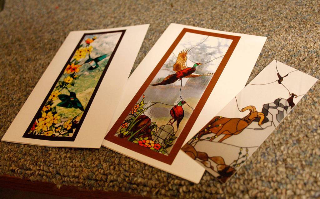 DeShongs artistic work included stained glass windows, three of which are pictured here. (Maria Matson / Whidbey News-Times)