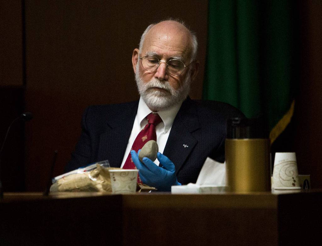 Dr. Eric Kiesel, a forensic pathologist, testifies about the autopsy of Jay Cook the trial of William Talbott II at the Snohomish County Courthouse on Friday in Everett. Talbott is on trial for the 1987 murders of Tanya Van Cuylenborg and Cook. (Andy Bronson / The Herald/POOL)