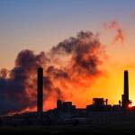 The Dave Johnson coal-fired power plant is silhouetted against the morning sun in Glenrock, Wyoming in July 2018. The Trump administration announced June 19, that it has rolled back a landmark Obama-era effort targeting coal-fired power plants and their climate-damaging pollution. (J. David Ake / Associated Press file photo)