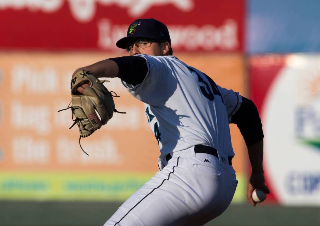The AquaSoxs Damon Casetta-Stubbs delivers a pitch during Everetts home opener against the Volcanoes on June 21, 2019, at Funko Field at Everett Memorial Stadium. (Andy Bronson / The Herald)