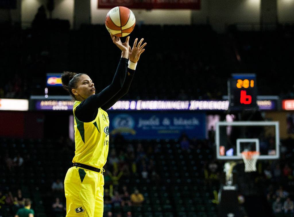 The Storms Alysha Clark makes a 3-pointer during a game against the Sparks on June 21, 2019, at Angel of the Winds Arena in Everett. (Olivia Vanni / The Herald)