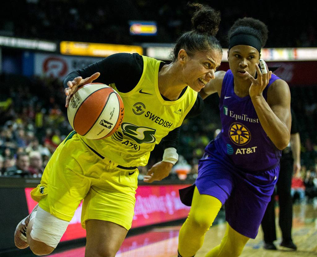 The Storms Alysha Clark drives to the hoop during a game against the Sparks on June 21, 2019, at Angel of the Winds Arena in Everett. (Olivia Vanni / The Herald)