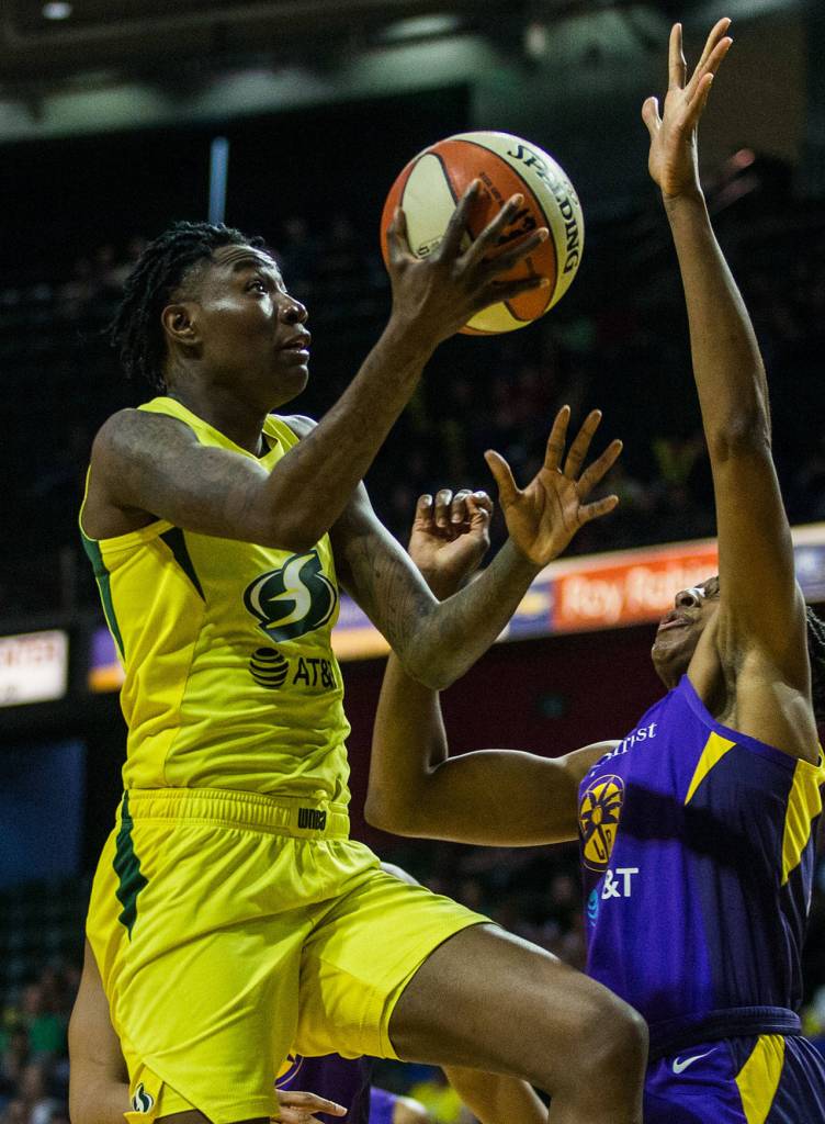 Seattle Storms Natasha Howard attempts a layup during the game against the Los Angeles Sparks at Angel of the Winds Arena on Friday, June 21, 2019 in Everett, Wash. (Olivia Vanni / The Herald)