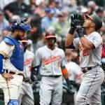 The Orioles Anthony Santander (right) crosses the plate after hitting a two-run home run as Mariners catcher Omar Narvaez look on during the sixth inning of a game on June 22, 2019, in Seattle. (AP Photo/Joe Nicholson)