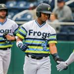 Everetts Robert Perez Jr. (center), followed by Carter Bins, is congratulated by teammate Luis Joseph after scoring a run Sunday at Funko Field. (Kevin Clark / The Herald)