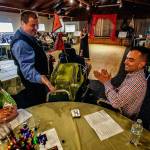 Edward Barhart, as Eduardo the Worst Magician in the World, performs card tricks with guests at the All Aboard talent show Wednesday. (Dan Bates / The Herald)