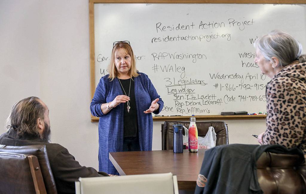 Mindy Woods presents the Resident Action Projects work to others who are or have experienced homelessness or housing insecurity. The group wants to grow membership around the state. (Lizz Giordano / The Herald)