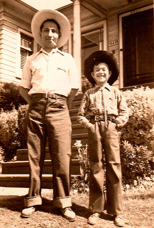 Father and son Billy and Mel Sturman in front of their Everett home in 1942. (Washington Jewish Museum)