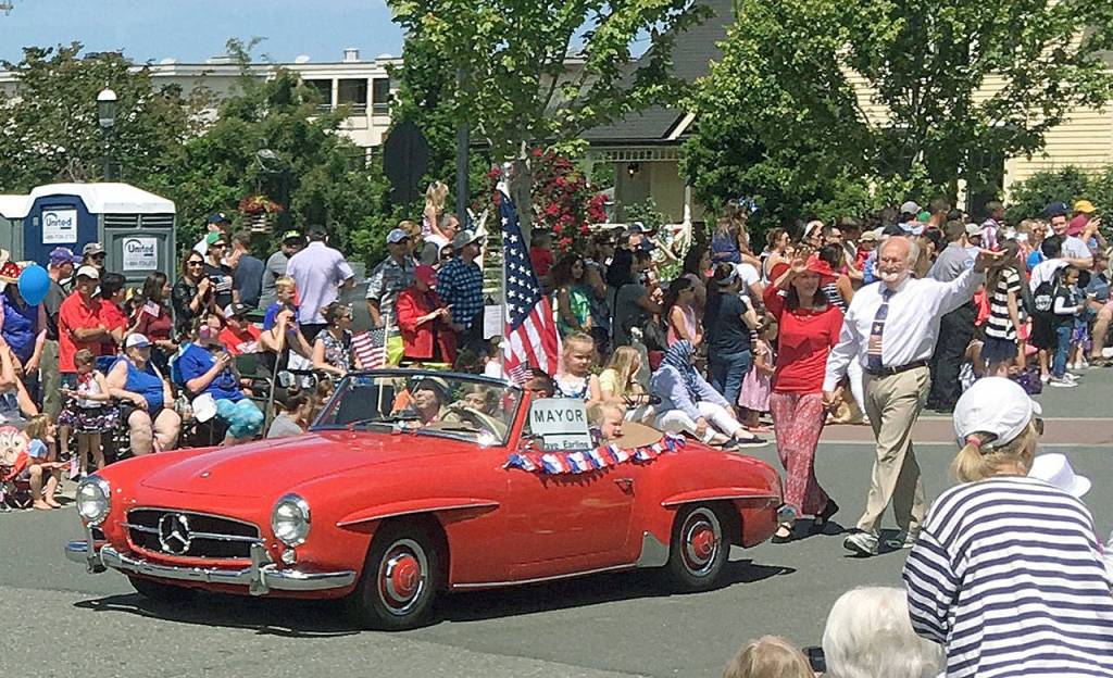 Since 2015, Olaf Weckner of Seattle has driven the parade car ahead of Edmonds Mayor Dave Earling. He is offers his red 1958 190SL Mercedes-Benz for the July 4th event as gratitude for his U.S. citizenship.                                (Submitted photo)