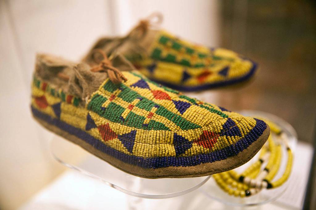A pair of moccasins, likely from the Cheyenne, is seen during a 2016 exhibit at the Hibulb Cultural Center. (Hibulb Cultural Center)
