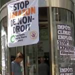 French protesters block Amazon sites over climate, jobs