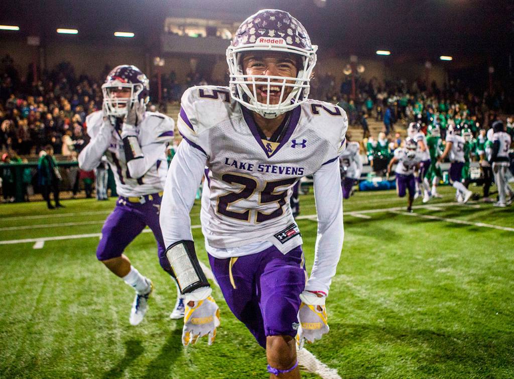 Kasen Kinchen celebrates after the Lake Stevens football team beat Woodinville to advance to the Class 4A state title game. (Olivia Vanni / Herald file)