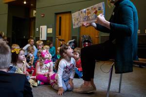 Riley Humphrey, 3, reacts to the story being read by Shannon Horrocks during Ms. Shannons story time at the Snohomish Library on Wednesday, May 15, 2019 in Everett, Wash. (Olivia Vanni / The Herald)