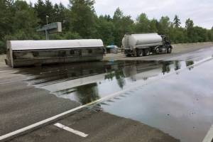 Tanker overturns near Centralia spilling oil; driver arrested