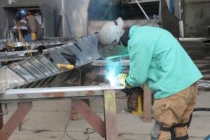 Jessie Stensland / Whidbey News Group                                A welder works on a high-speed passenger ferry that Nichols Brothers is building for Kitsap Transit.