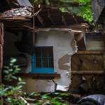 A window can be seen as demolition continues at Camp Silverton on July 6 in Silverton. (Olivia Vanni / The Herald)