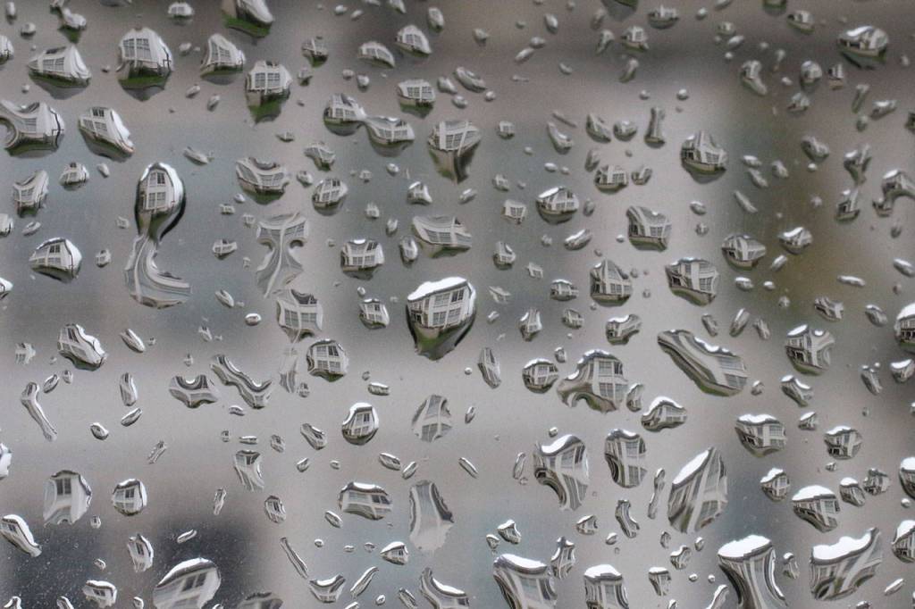 The historic Longfellow building is reflected in raindrops on Nov. 28, 2016 in Everett. (Andy Bronson / Herald file)