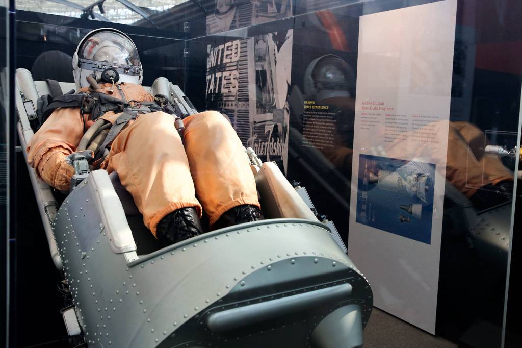 The SK-1 spacesuit, worn by Vostok cosmonauts during training, is part of the Destination Moon: The Apollo Mission exhibit. (Kevin Clark / The Herald)