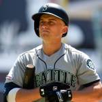 Seattle Mariners third baseman Kyle Seager heads to the dugout after striking out against the Minnesota Twins in the first inning of a game on June 13 in Minneapolis. (Craig Lassig / Associated Press)