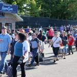 Season ticket holders enter the park on Funko Friday at Funko Field in Everett on July 12, 2019. (Kevin Clark / The Herald)