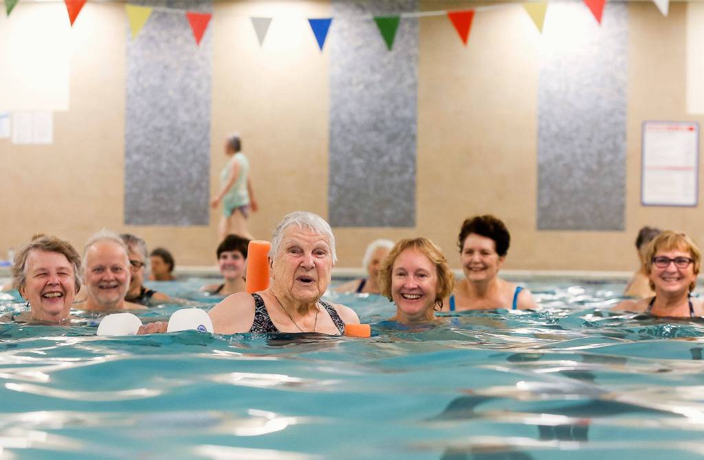 For her 100th birthday party, Teresa Schmierer celebrated at Everetts 24 Hour Fitness with her water aerobics class. (Dan Bates / The Herald)