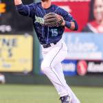 The AquaSoxs Patrick Frick gathers a ground ball at third base during a game against the Canadians on July 12, 2019, at Funko Field in Everett. (Kevin Clark / The Herald)