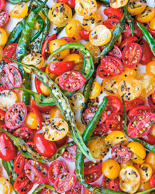 The heat from this recipe for green chile and cherry tomato pickle dulls by the next day  and like most Indian dishes, tastes even better. (Mackenzie Smith)