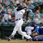 The Mariners Domingo Santana watches his three-run home run during the first inning of a game against the Royals on June 19, 2019, in Seattle. (AP Photo/John Froschauer)