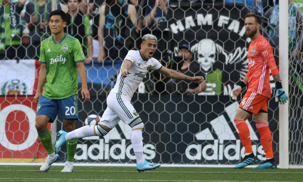 Brian Fernandez cheers after scoring the first goal as the Seattle Sounders lost 2-1 to the Portland Timbers at CenturyLink Field on Sunday, July 21, 2019 in Seattle, Wash. (Andy Bronson / The Herald)