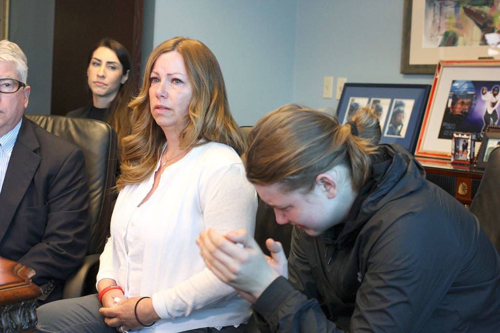 Jayni Peters, shown here with her son, Jack Peters, on June 6 at the Campiche Arnold law firm in Seattle, said her son, Nickolas Peters, didnt deserve to be killed. ( Zachariah Bryan / Herald file)
